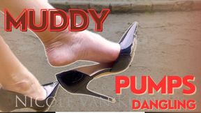 Dangling muddy pump - Posh Mistress Nicole with dirty black high heels in the gardens - sandy soles