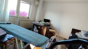 Amateur woman doing housework naked Sexy and naughty wife trying on clothes she cuts.