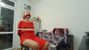 Sofi in a red dress tied to a chair with a white rope_Ordro_Backstage_Part 1-2_Full version