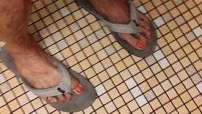 Flexing muscular calves and veins