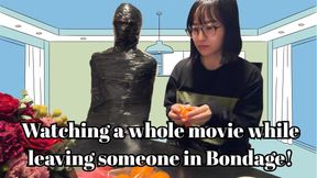 Watching a whole movie while leaving someone in mummy-style Bondage!