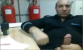 Horny worker doing a solo at work