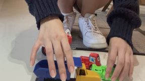 Laura Crushing Toy Cars