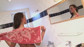 Hairy babe is having a shower