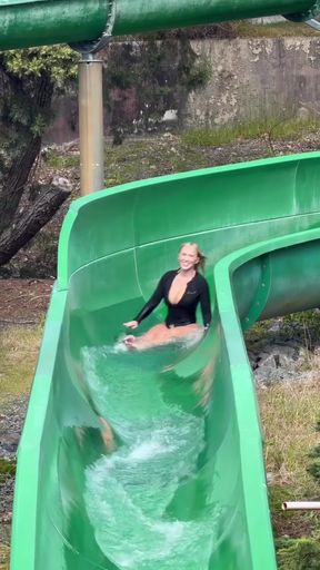 Aussie blonde babe in a swimsuit shows off her big tits