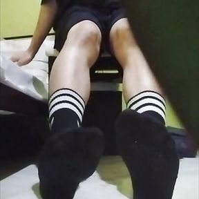 Twink teen boy showing his dirty stinky black socks