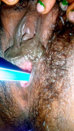 Geeta Bhabhi having sex with a pencil in a dark room