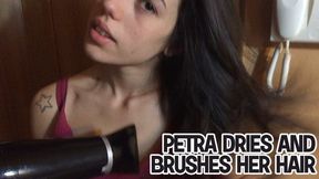 Petra dries and brushes her hair - HD