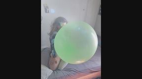 Blowing a giant Wubble balloon in a hot Summer day