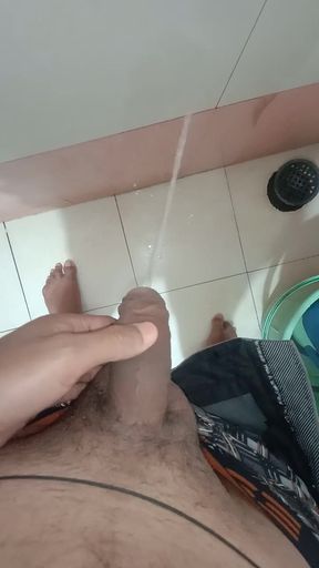 Pissing in bathroom