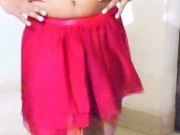 Ladyboy sissy simran sensual dance and show off her caged clitty and plugged black asshole in strip