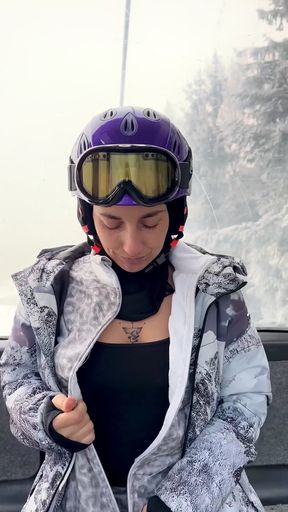 Solitary athlete flashes some skin on a cable car ride