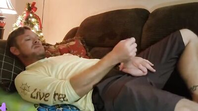 Horny guy watches some gay porn while stroking that hard cock