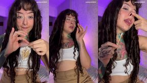 cute girl with a split tongue sneezes for you