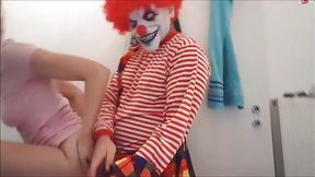 Horror clown fucks brunette teen in the bathroom