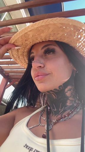 Blonde woman in straw hat