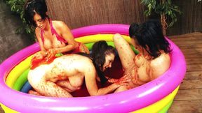 Three gorgeous honeys get playful in a pool of jello