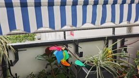 Playing and squirting on balcony with pussy