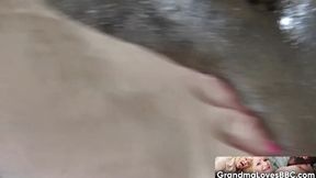 Grandma Lacey Starr did a very good job in stroking my dick with her feet