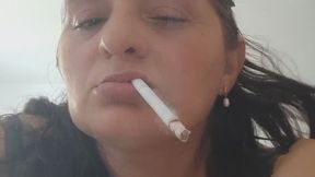 Smoking My First Cigarette of the Day While Lying on My Stomach in Bed.