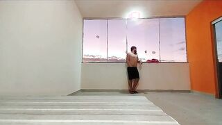 I went up to the terrace and stood bare waiting for someone to witness me in the fresh building.