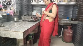 In the kitchen, the brother-in-law made the beautiful sister-in-law in red saree do the doggy style and fucked her.