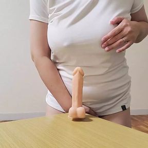 A married woman gets excited by fantasizing about masturbating with a dildo