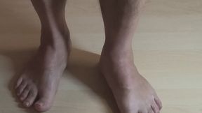 I am showing you my bare feet with my video record on the floor.