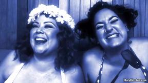 ”Two heavy dominas strapon-fucking their slave”