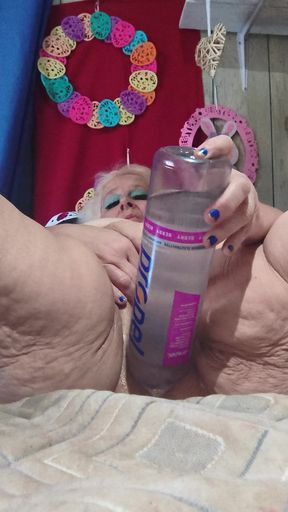 Big Bottle Plugged Clit Cunt