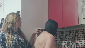 Domestic slave cleaning kitchen