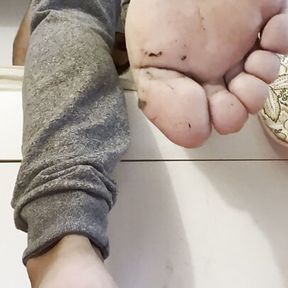 Dirty soles man feet