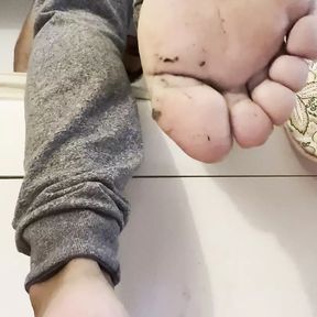 Dirty soles man feet