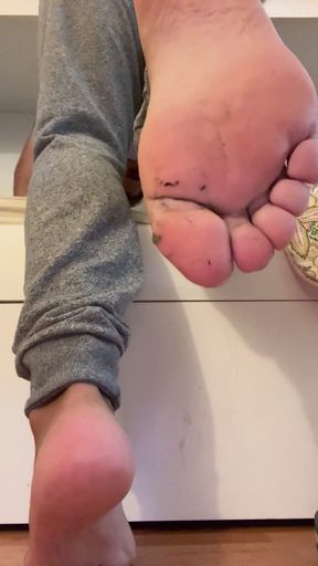 Dirty soles man feet