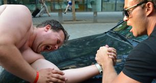 Jocks show the challenger its place during arm wrestling