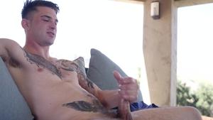Next Door Male: Brunette jerking big dick outdoors