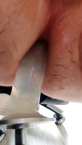 Transparent dildo goes deep into gay man's bum