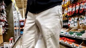 Public freeballing in grocery store. Caught a few guys staring at my visible cock outline