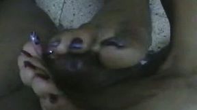 Ebony Jamaican prostitute giving me footjob massage