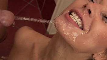 That slutty Milf sucks her friend&#039_s eager cock and gets pissed on her face and pussy